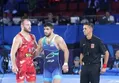 دردسر جدید برای قهرمان کشتی جهان: پول‌مان را پس بده!